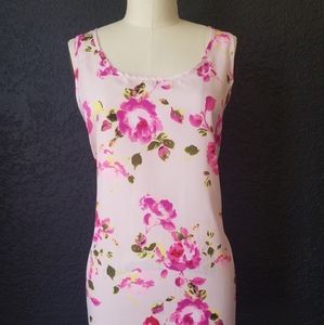 Pastel pink soft tank top with lace-back opening